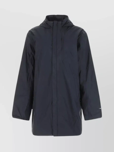 RAINS HOODED RAINCOAT WITH DRAWSTRING AND SLIT POCKETS