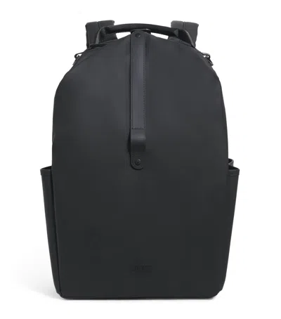 Rains Waterproof Clip Front Backpack In Black