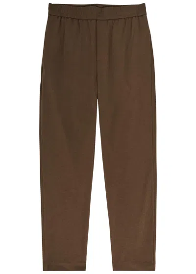 Raith Geneva Textured Tapered-leg Jersey Trousers In Brown
