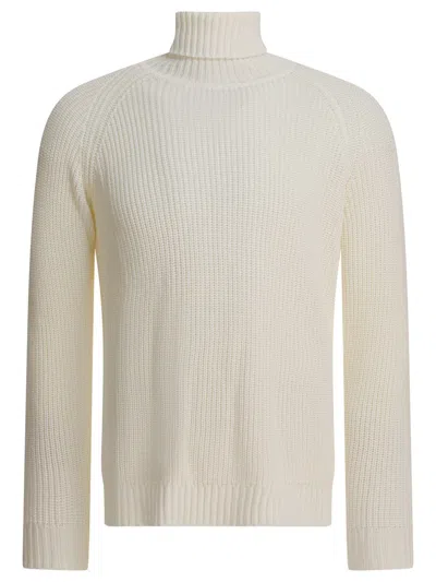 RAKKÌ RAKKÌ TURTLENECK SWEATER "REBEL"