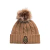 Ralph Lauren Crest-patch Pom-pom Cable-knit Beanie In Brown