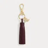 Ralph Lauren Logo & Leather Tassel Charm In Brown
