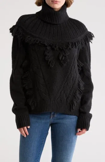 Ramy Brook Mya Cable Stitch Fringe Turtleneck Sweater In Black Cable W Fringe