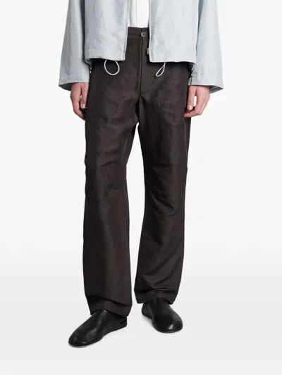 Ranra Grid-pattern Straight-leg Trousers In Brown