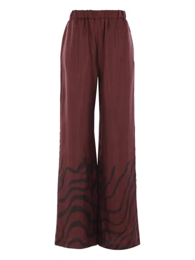 RAQUEL DINIZ ZEBRA-PRINT WIDE-LEG TROUSERS