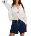 Re/done 90s Crop Low Slung Jean Shorts In Heritage Rinse In Blue