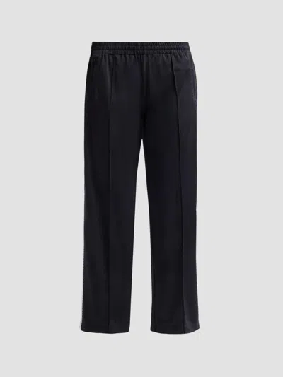 Re/done Women's Mel Crease-front Track Pants In Black With White