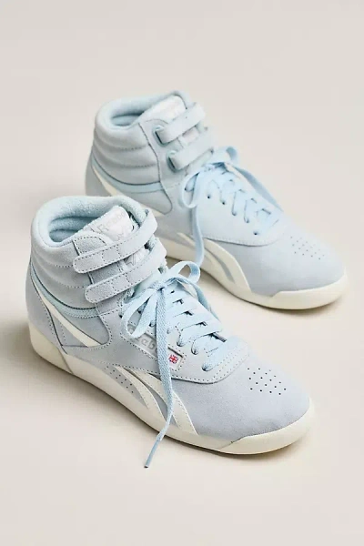 Reebok Freestyle High Top Sneakers In Blue