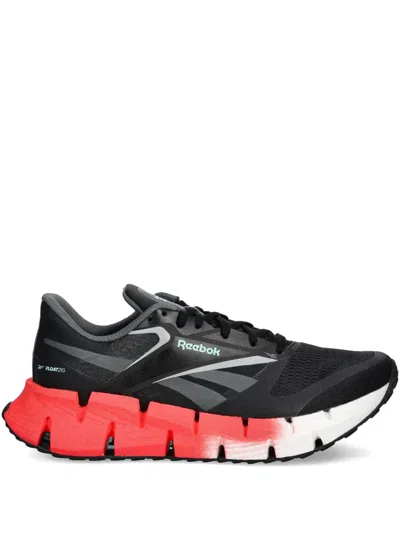 Reebok Logo-print Sneakers In Black