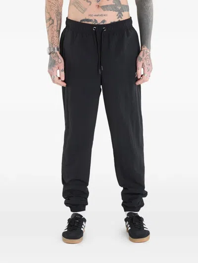 Reebok Logo-print Track Pants In Black