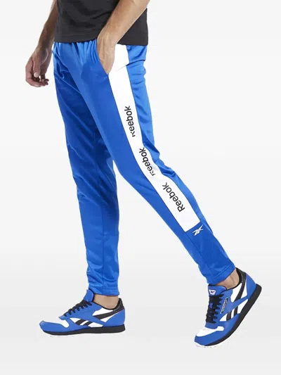 Reebok Logo-tape Track Pants In Blue