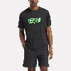 Reebok Distance Short Sleeve Crewneck Graphic Running T-shirt In Black