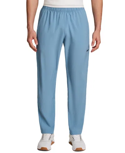 REEBOK MEN'S WOVEN LOGO TRACK PANTS