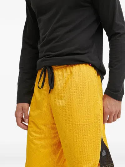 Reebok Mesh Track Shorts In Yellow