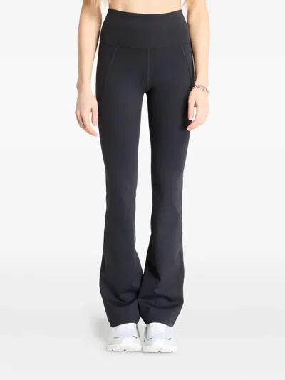 REEBOK SIDE-POCKET FLARED TROUSERS