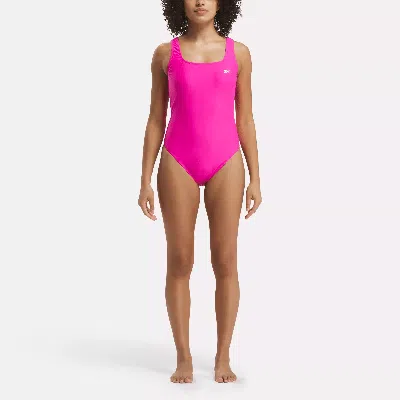 Reebok Women's Basic One-piece Swimsuit With Low Scoop Back In In Pink
