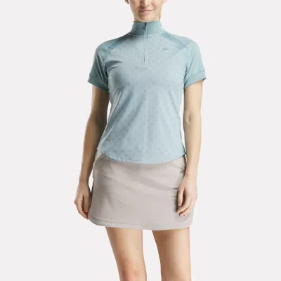 Reebok Women's Short Sleeve 1/4 Zip Mini Argyle Print Top In Blue