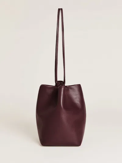 Reformation Dimitra Pouch Bag In Ruby Leather