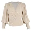Reformation Mela Peplum Wrap Top In Cream Velvet In Neutral
