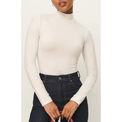 Reformation Nell Turtleneck Jersey Top In Horchata