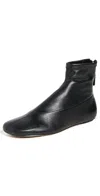 Reformation Payton Stretch Bootie In Black Stretch Leather