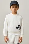 Reiss 5 Years In White