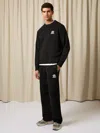Reiss Black Monogram Wool Wide-leg Knitted Joggers In Black