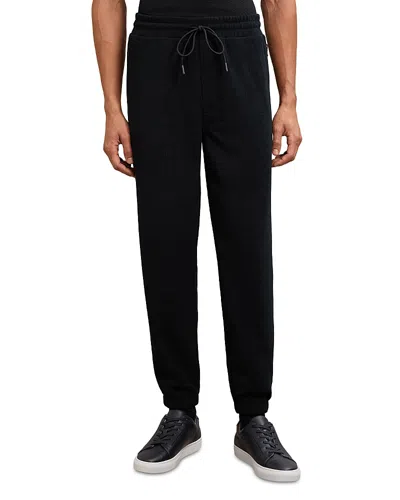 Reiss Corduroy Jogger Pants In Black