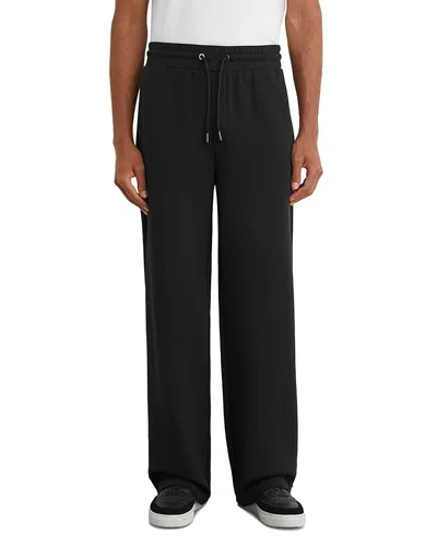 Reiss Relaxed Fit Rivo Interlock Joggers In Black