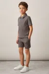Reiss Tobacco Brown/navy 9-13 Yrs Geometric Jacquard Polo Shirt In Tobacco Brown/navy