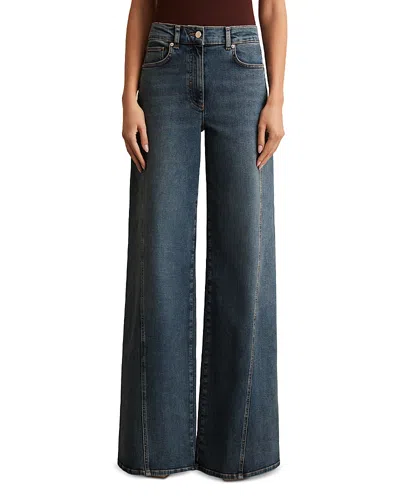 REISS TWISTED SEAM WIDE LEG JEANS IN MID BLUE