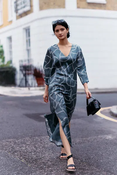 REISTOR MAXI DRESS WITH SIDE SLITS IN ABSTRACT STRIPES
