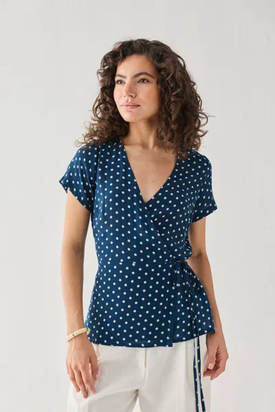 Reistor Wrap-around Top In Navy Blue Polka