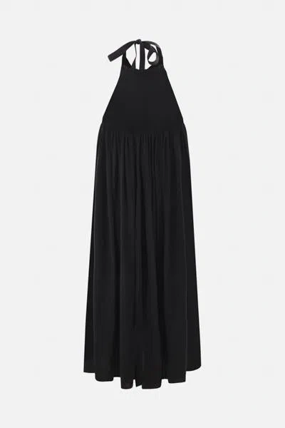Renata Brenha Dresses In Washed Black