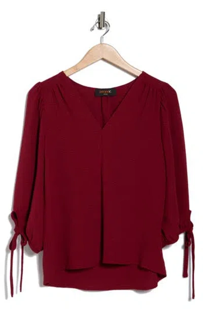 Renee C Ditsy Puff Sleeve Blouse In Burgundy