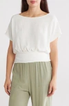 Renee C Short Sleeve Smocked Hem Blouson Top In White