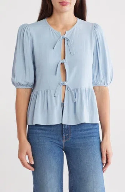 Renee C Tie Front Peplum Top In Sky Blue