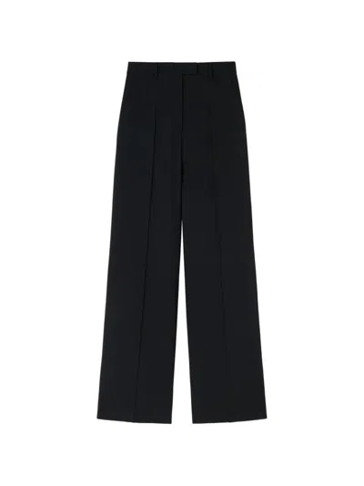 Retori Pleated Wide-leg Trousers In Black