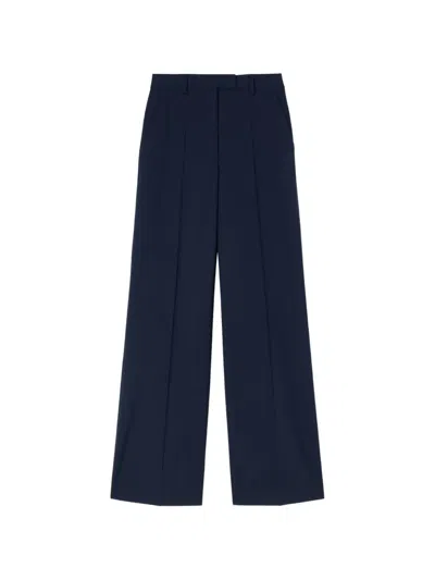 Retori Pleated Wide-leg Trousers In Blue