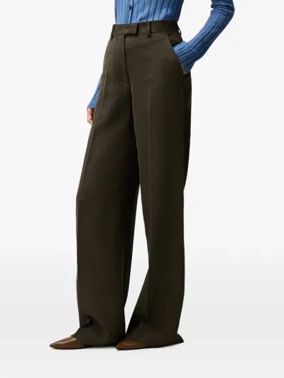 Retori Pleated Wide-leg Trousers In Green