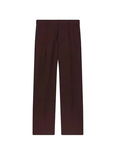 Retori Pleated-front Trousers In Brown
