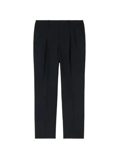 Retori Pleated-front Virgin-wool Trousers In Black