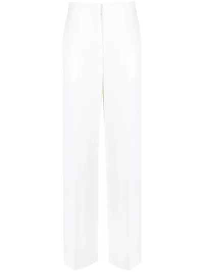 Rev The Steward Virgin-wool Trousers In White