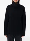 Rhea Heavy Turtle Neck Sweater In Black