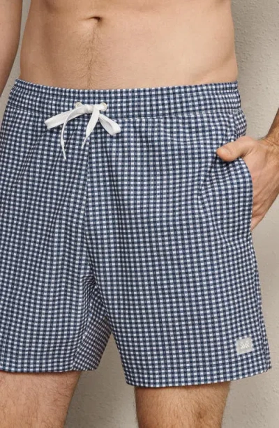 Rhone 5.5-inch Water Repellent Swim Trunks In Blue