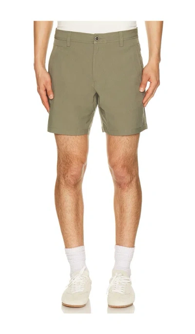 Rhone 7 Nomad Tech Chino Short In Green
