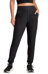 Rhone Dreamglow Tapered Pants In Black