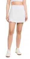 Rhone Course To Court Sport Skort Snow White In Sand