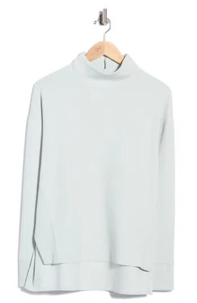 Rhone Dreamglow Mock Neck Pullover In Blue