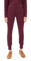 Rhone Dreamglow Taper Leg Pants Bordeaux Red In Burgundy
